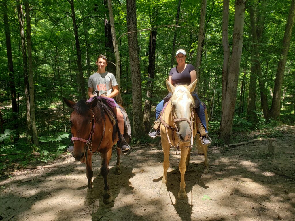 20190708_130032 Woman and boy on horseback